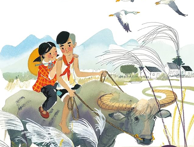 Two children on a water buffalo in the Chinese countryside