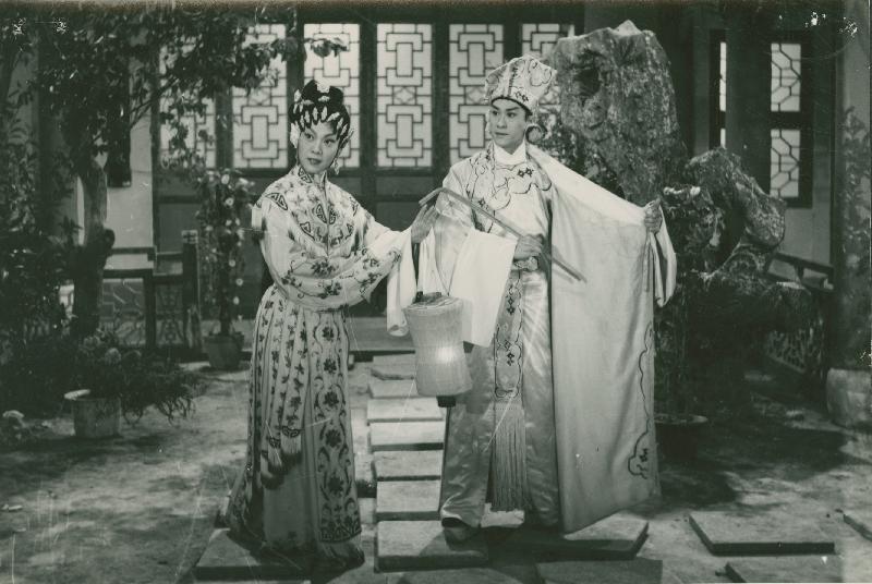a women and a man are holding their hands